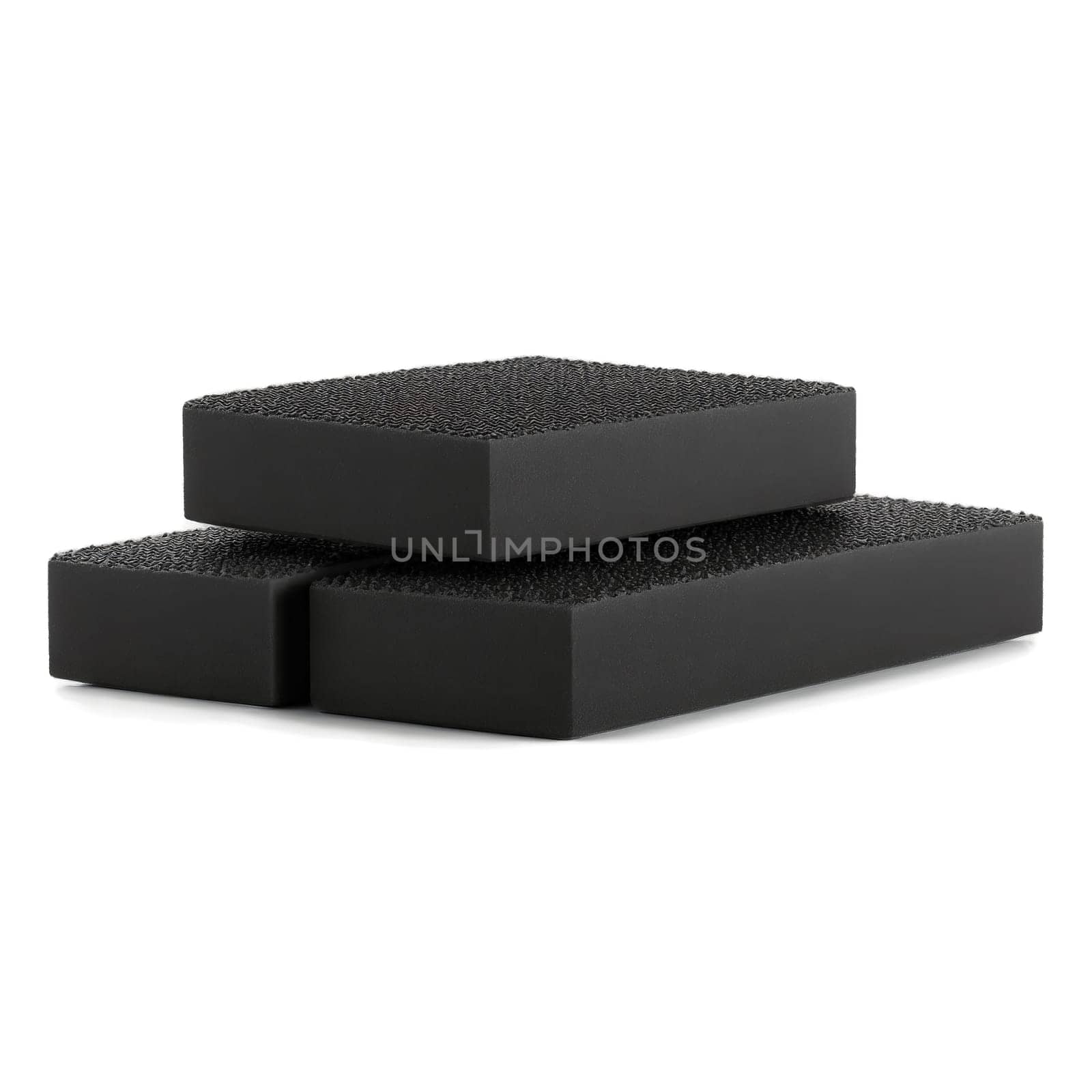 Sliders pair of black foam sliders with a smooth bottom surface stacked on top of.