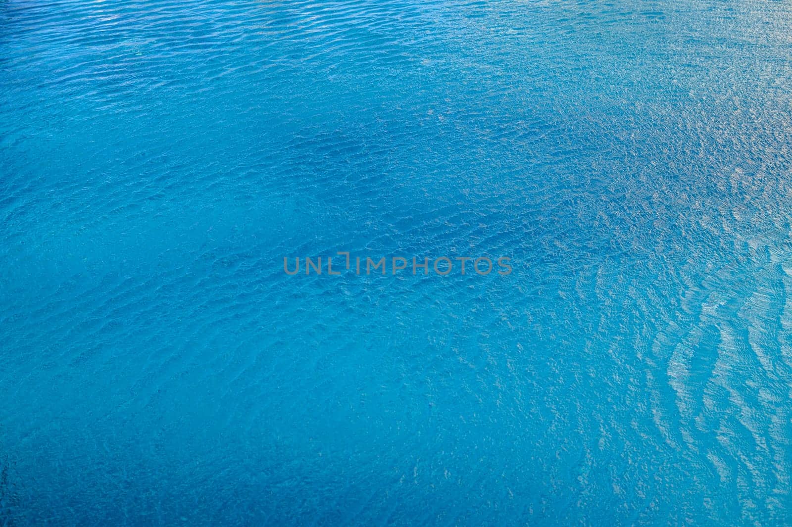 Swimming Pool Surface With Light Reflection and Water Ripple Patterns 2