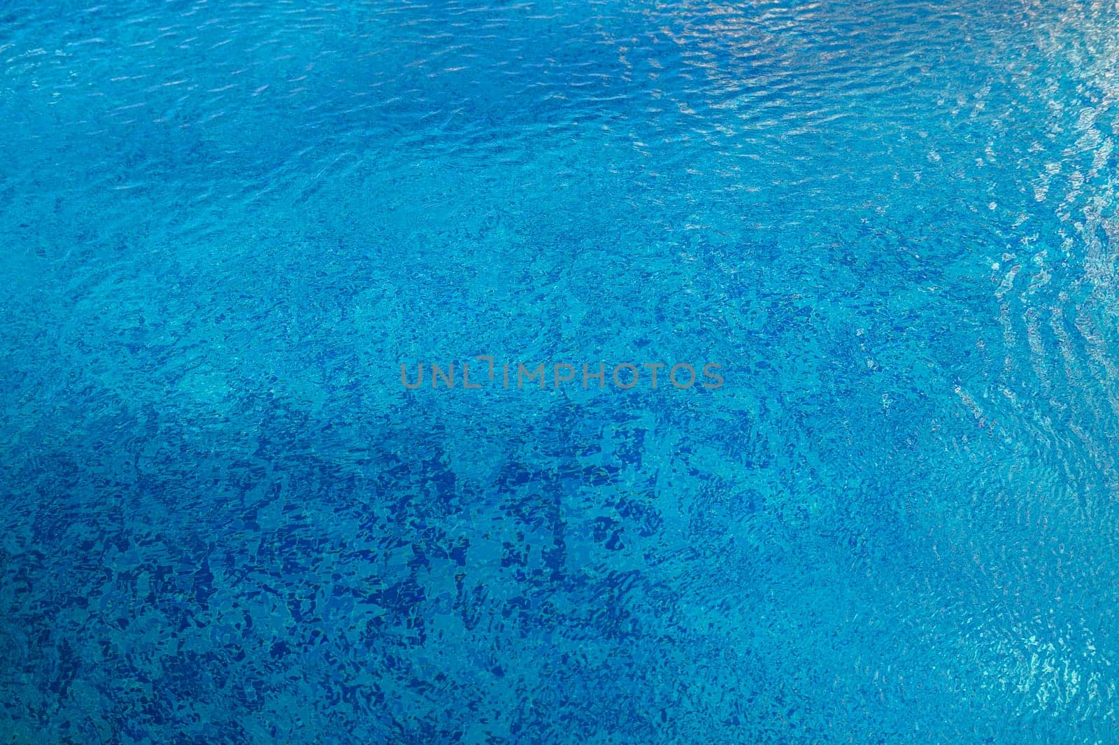 Swimming Pool Surface With Light Reflection and Water Ripple Patterns 3