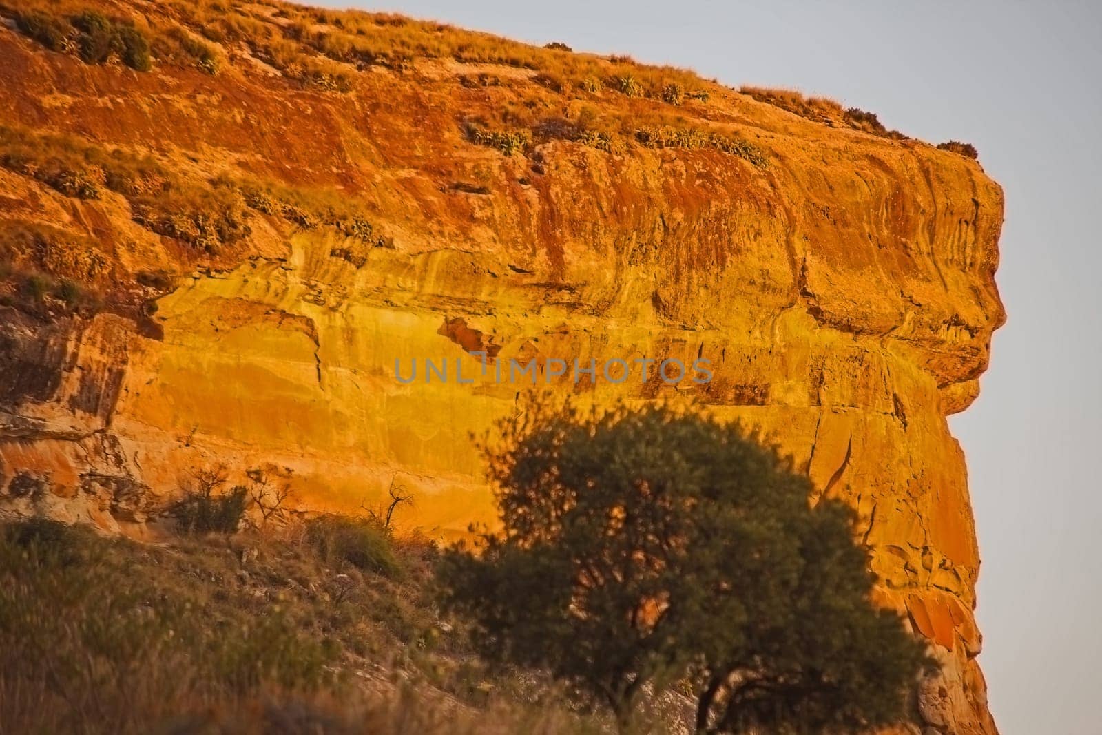 Golden Clarens sandstone cliffs near Fouriesburg in the Eastern Free State Province. South Africa