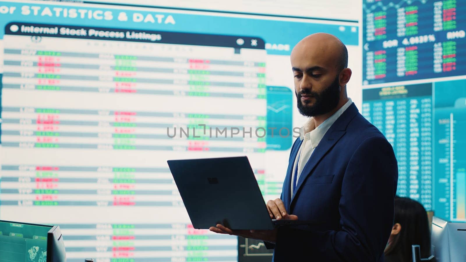 Business investor reviewing latest budgeting plans on a big screen with data reports, collecting details about financial updates to ensure global expansion. Shareholder making decisions. Camera A.