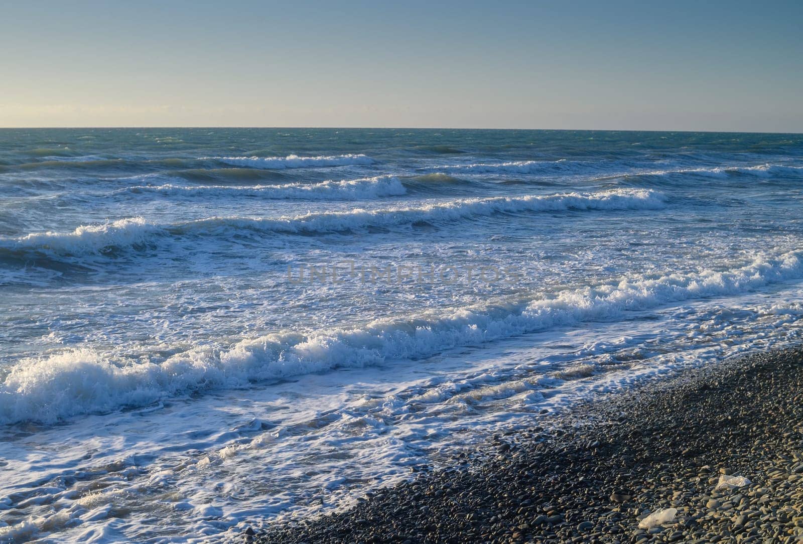 sea ​​foam on the waves of the Mediterranean sea on a summer evening 2 by Mixa74