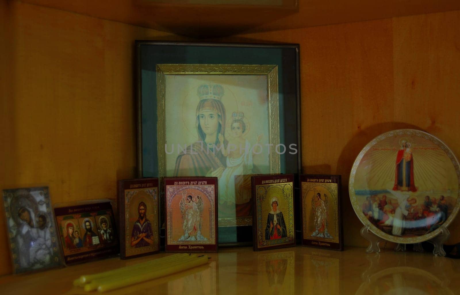 Many icons stand in the prayer corner.