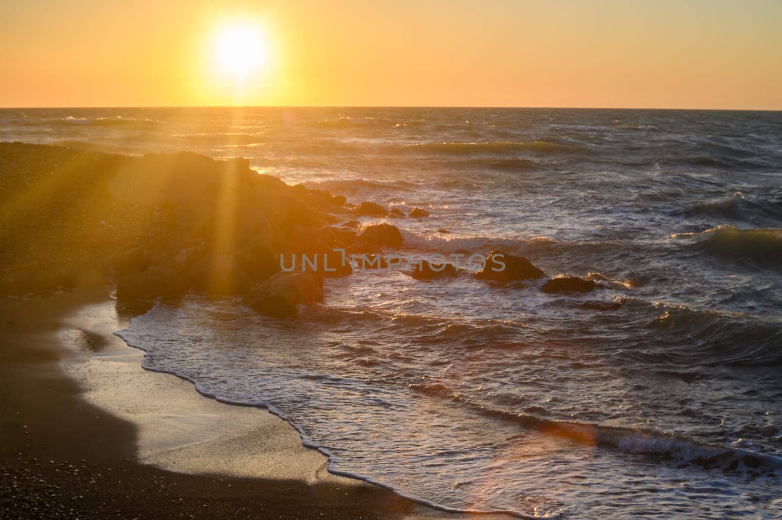 the sun sets in the Mediterranean Sea in Cyprus