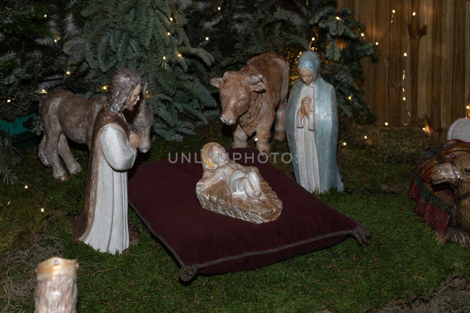 Christmas figurines in a creche with Joseph Mary and small Jesus