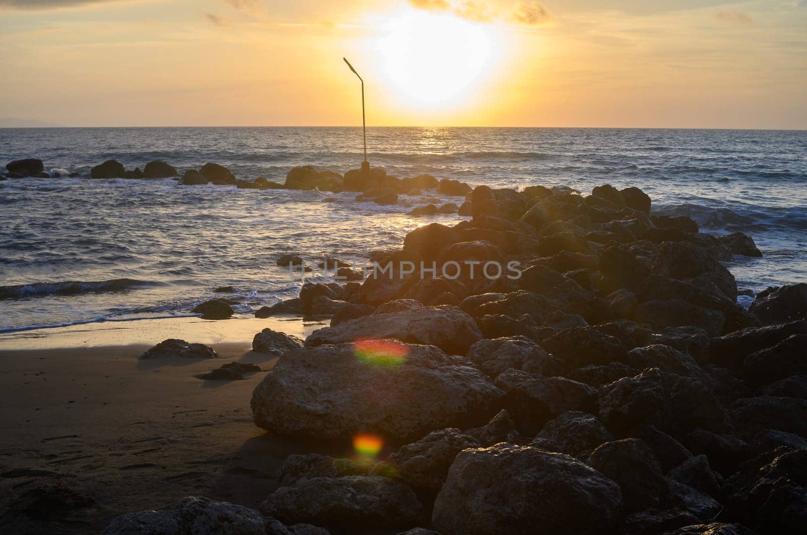 Sea landscape, sand beach and rocks on foreground. by Mixa74