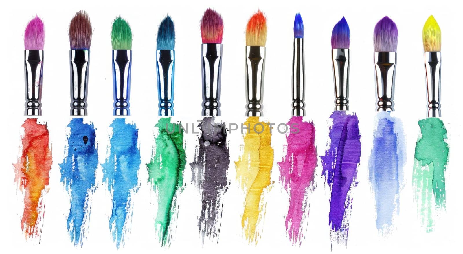 Variety of colorful paint brushes isolated on white background, art supplies for creative projects