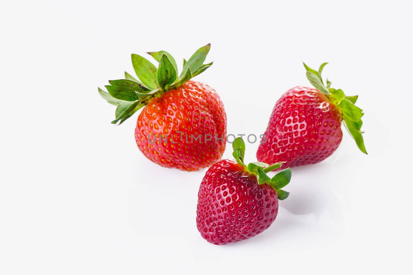 Pile of delicious fresh red strawberries on white background by Mixa74