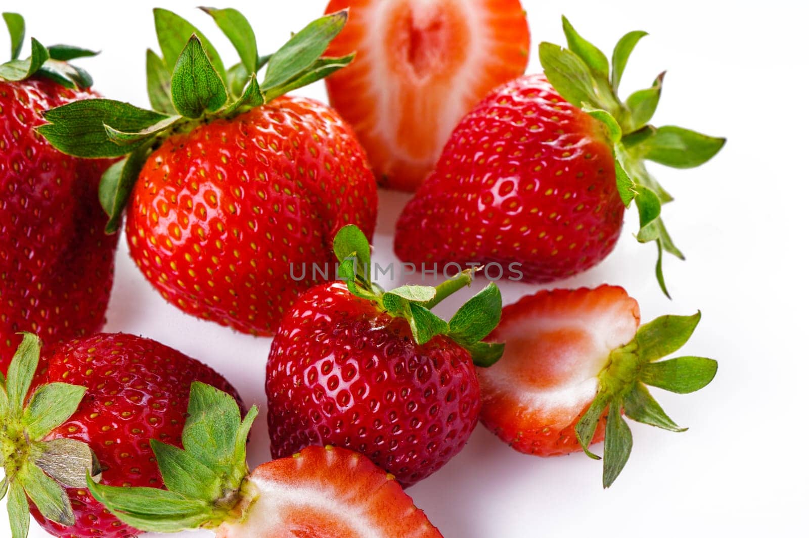 Group of Juicy Strawberry with half sliced isolated on white background. by Mixa74