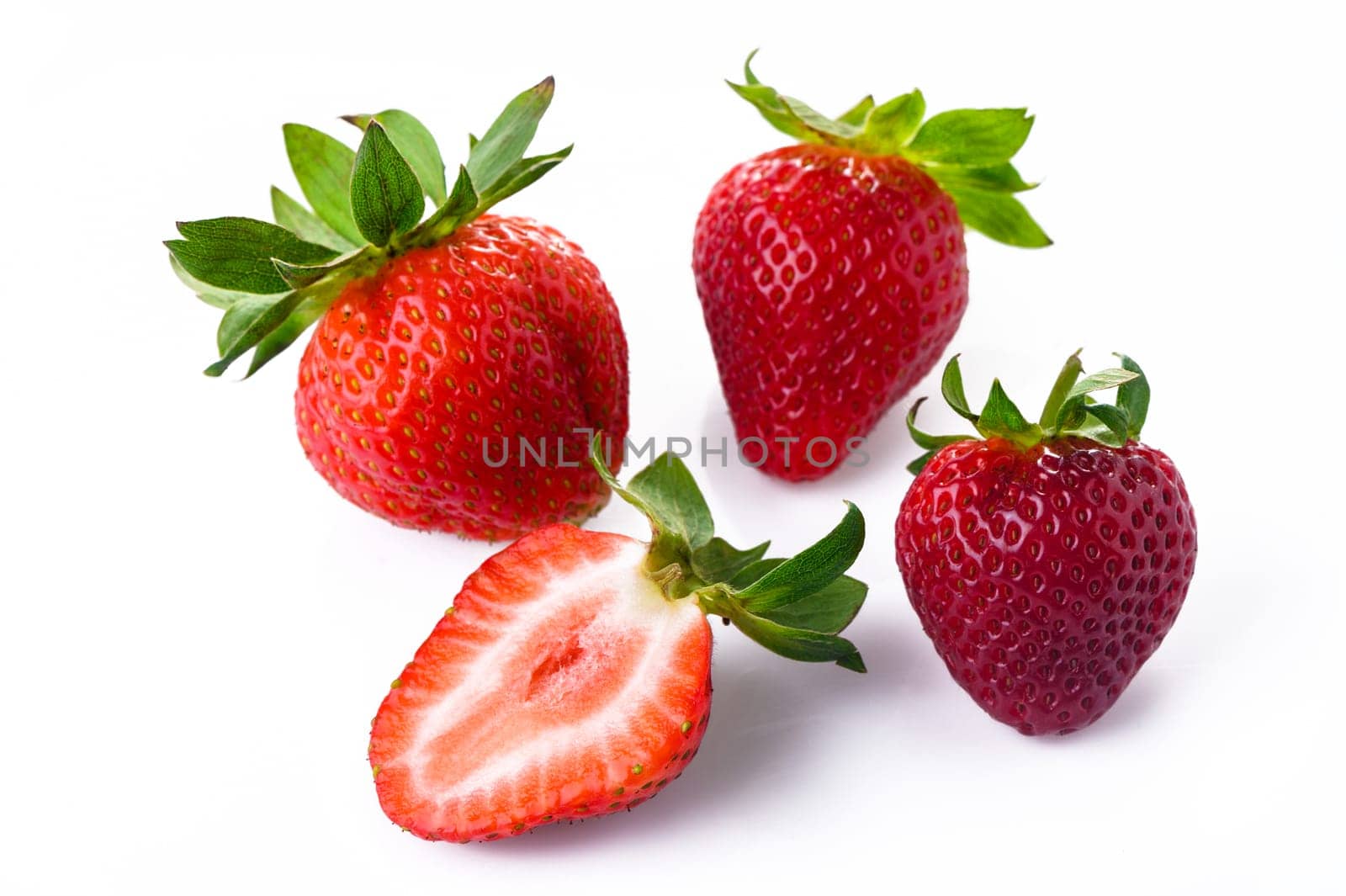 Ripe perfect strawberry and cross cut of strawberry isolated on white background. by Mixa74