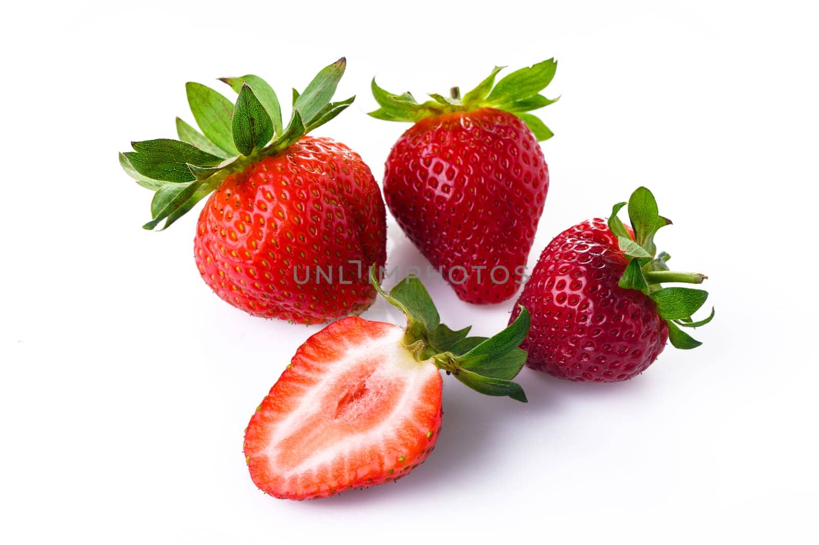 Overhead view of strawberries over white background