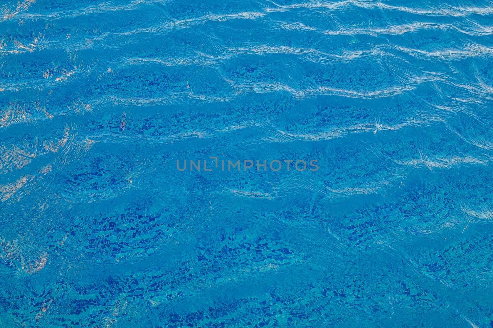 Swimming Pool Surface With Light Reflection and Water Ripple Patterns 1