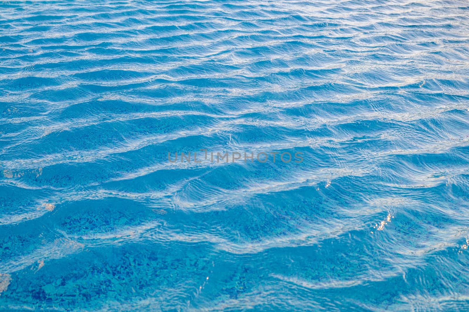 Swimming Pool Surface With Light Reflection and Water Ripple Patterns 2