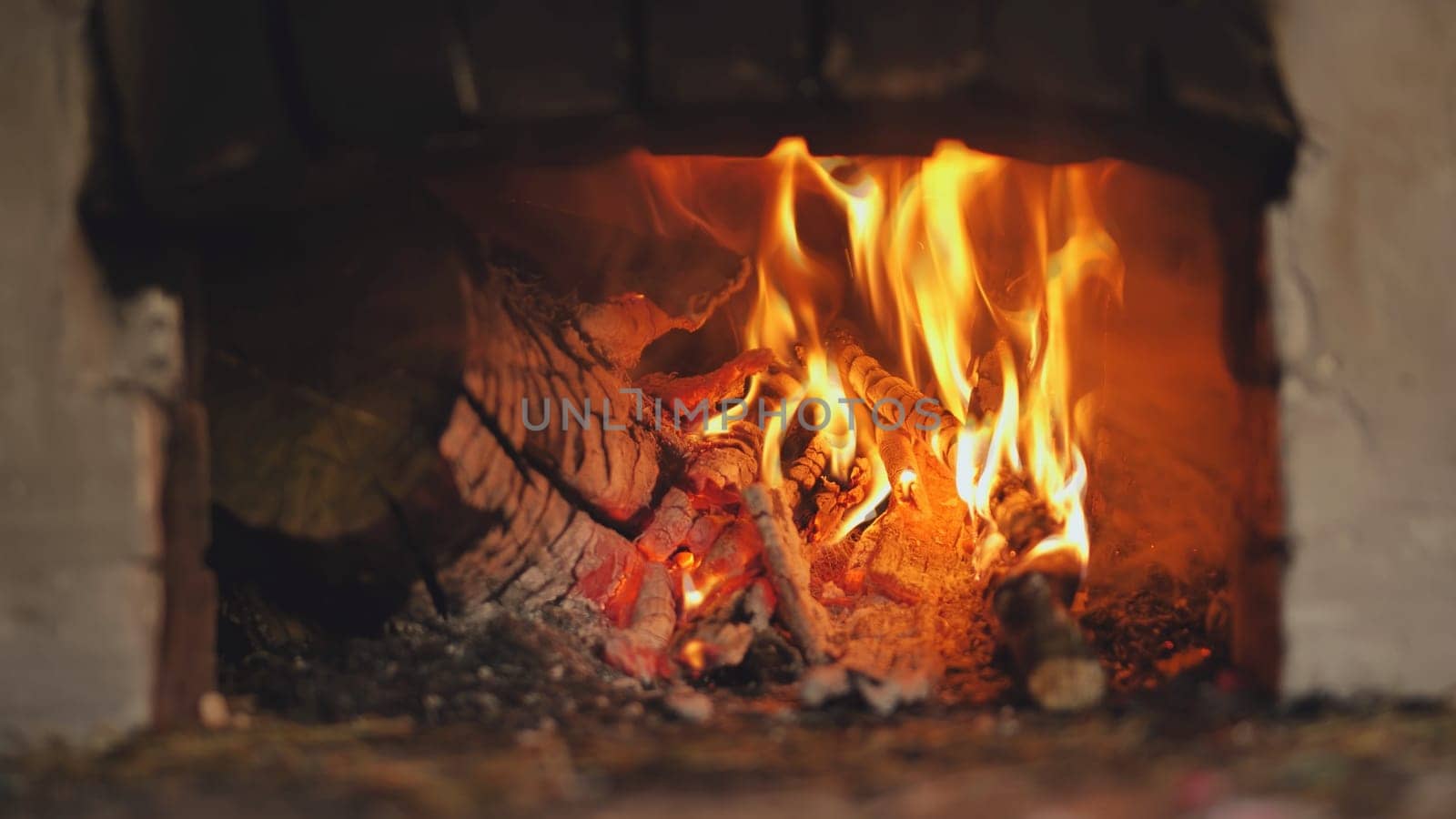 Burning fire in a Russian stove in the village