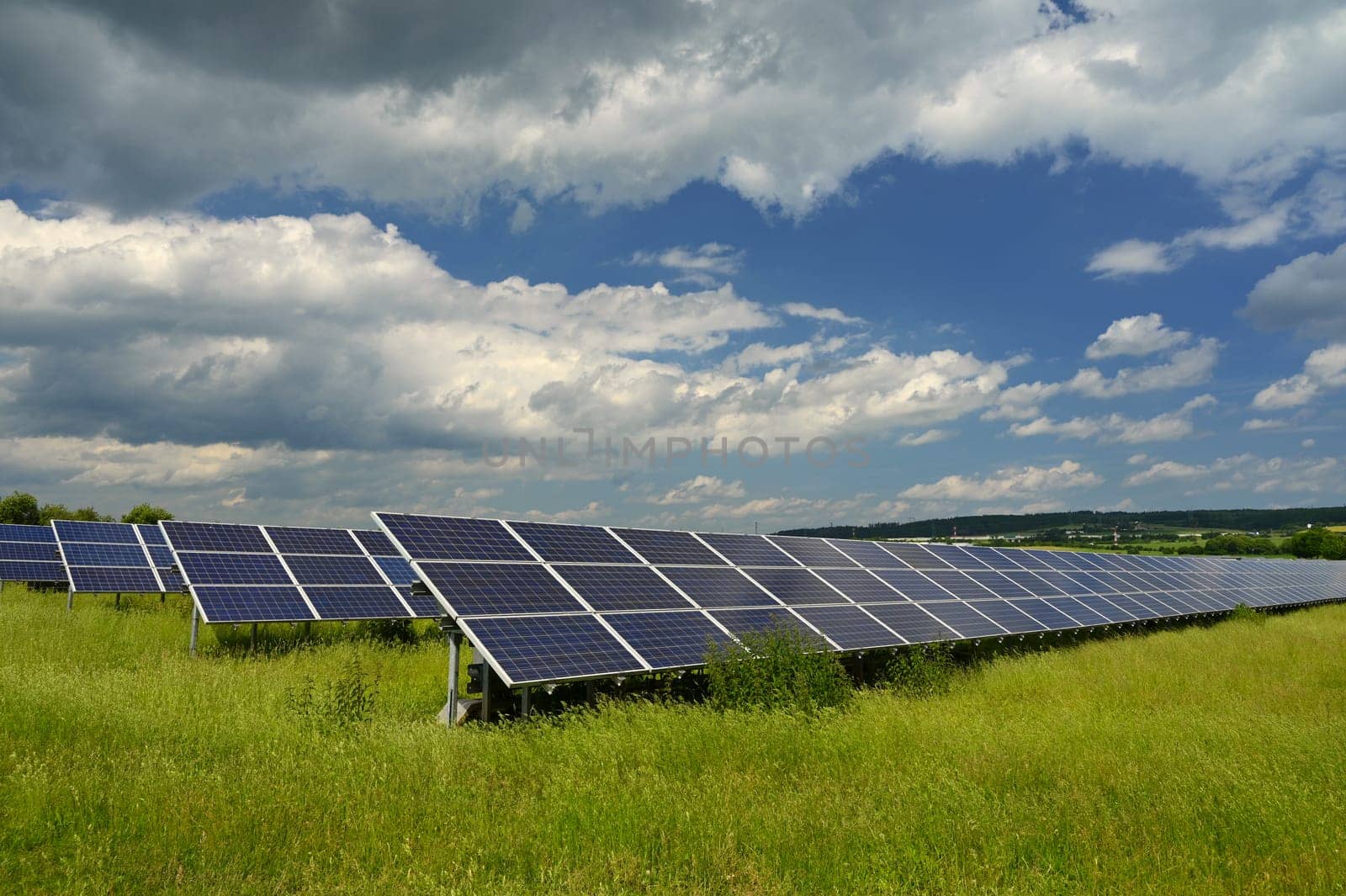 Technology solar cell. Solar panels on the sky background. Power plant. Alternative source of electricity. Solar farm. by Montypeter