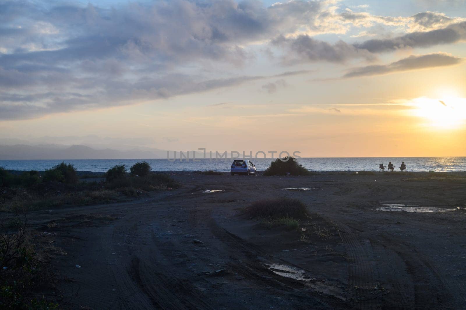 the sun sets into the sea on the Mediterranean coast on the island of Cyprus 1 by Mixa74