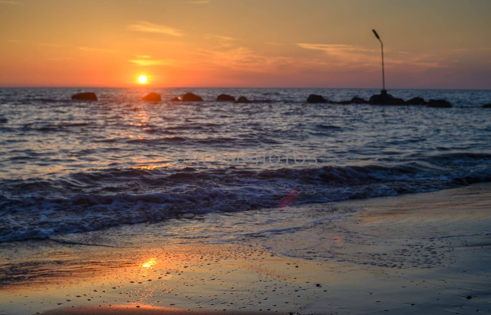 beautiful golden sunset on the Mediterranean coast on the island of Cyprus