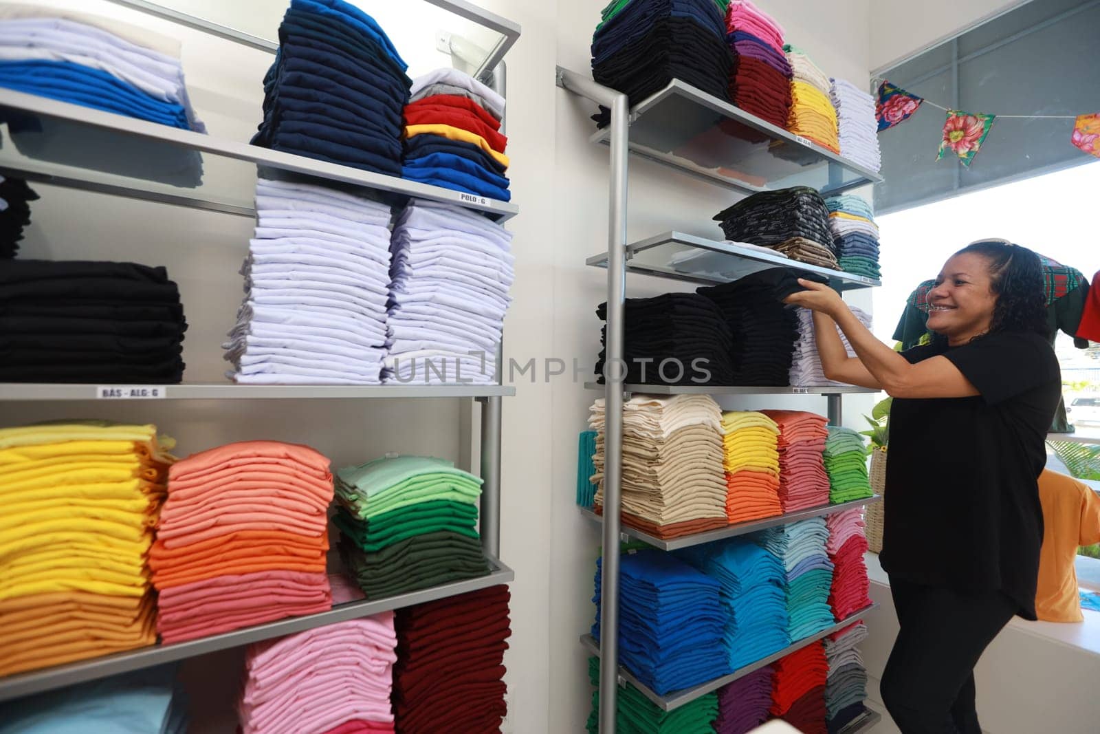 salvador, bahia, brazil - june 7, 2024: loja de venda roupas em uma junto a uma fábrica de costura na cidade de Salvador.