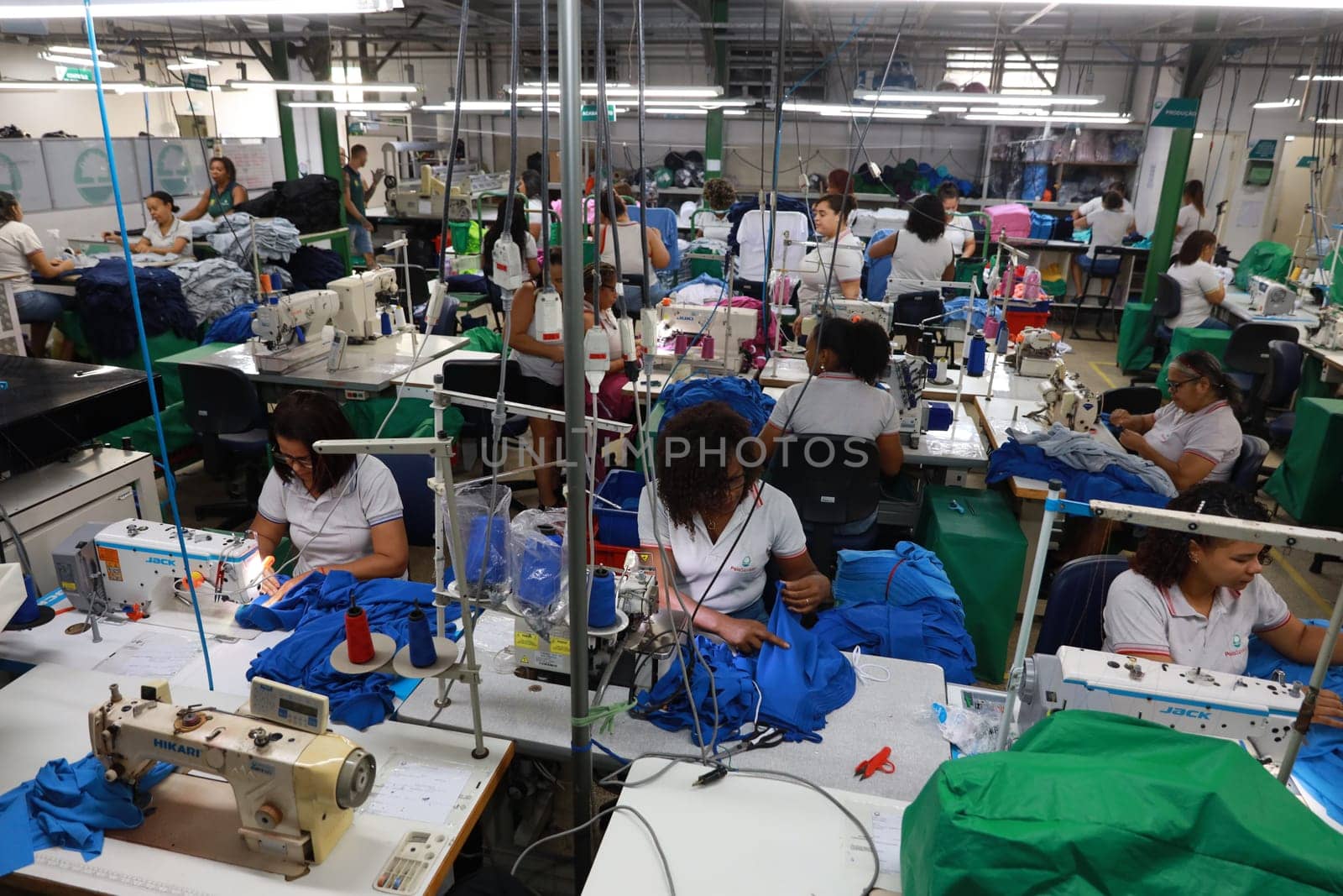 salvador, bahia, brazil - june 7, 2024: seamstress working in a textile factory in the city of Salvador.