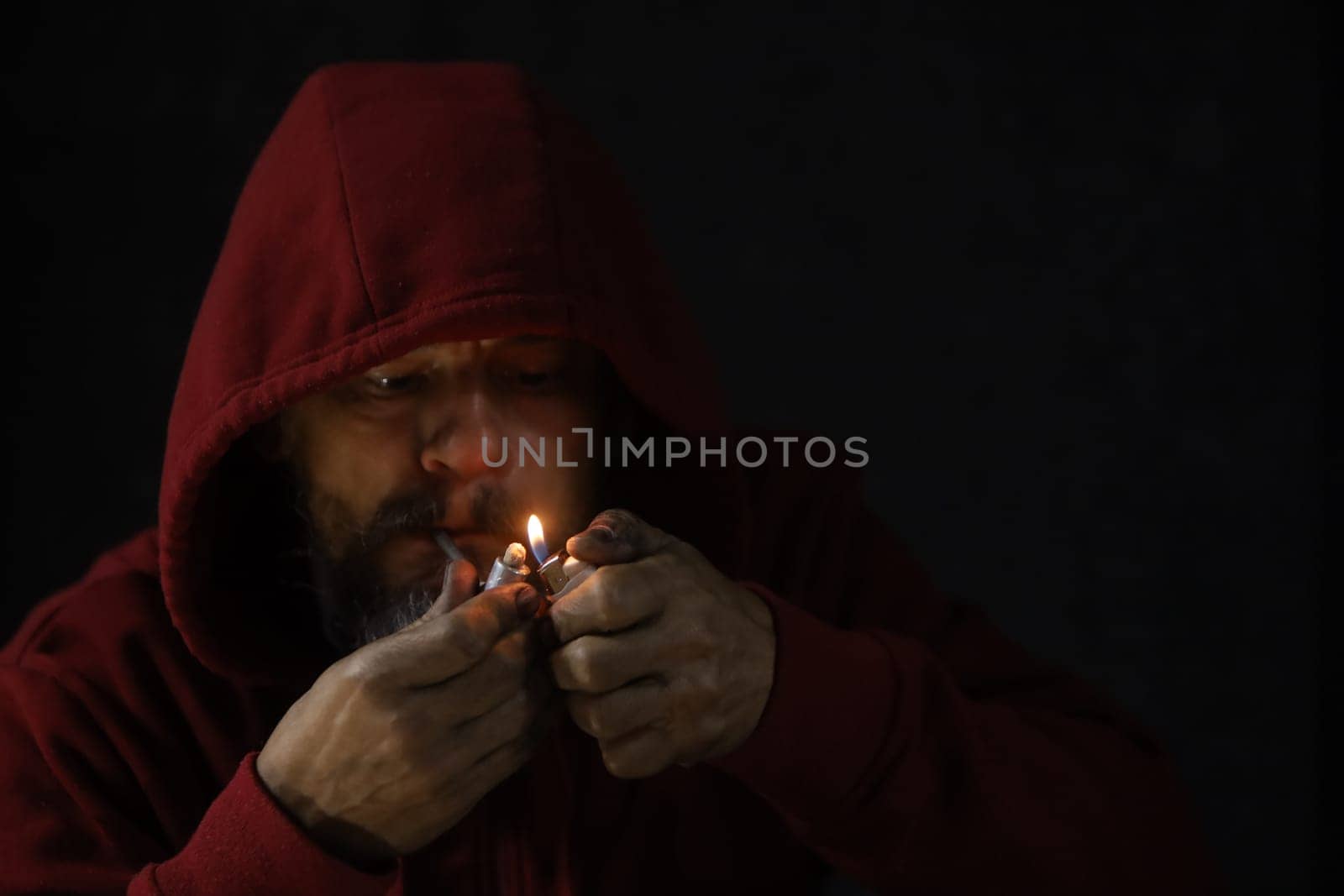 salvador, bahia, brazil - october 10, 2022: Crock user smoking the drug with a metal pipe in Salvador city.