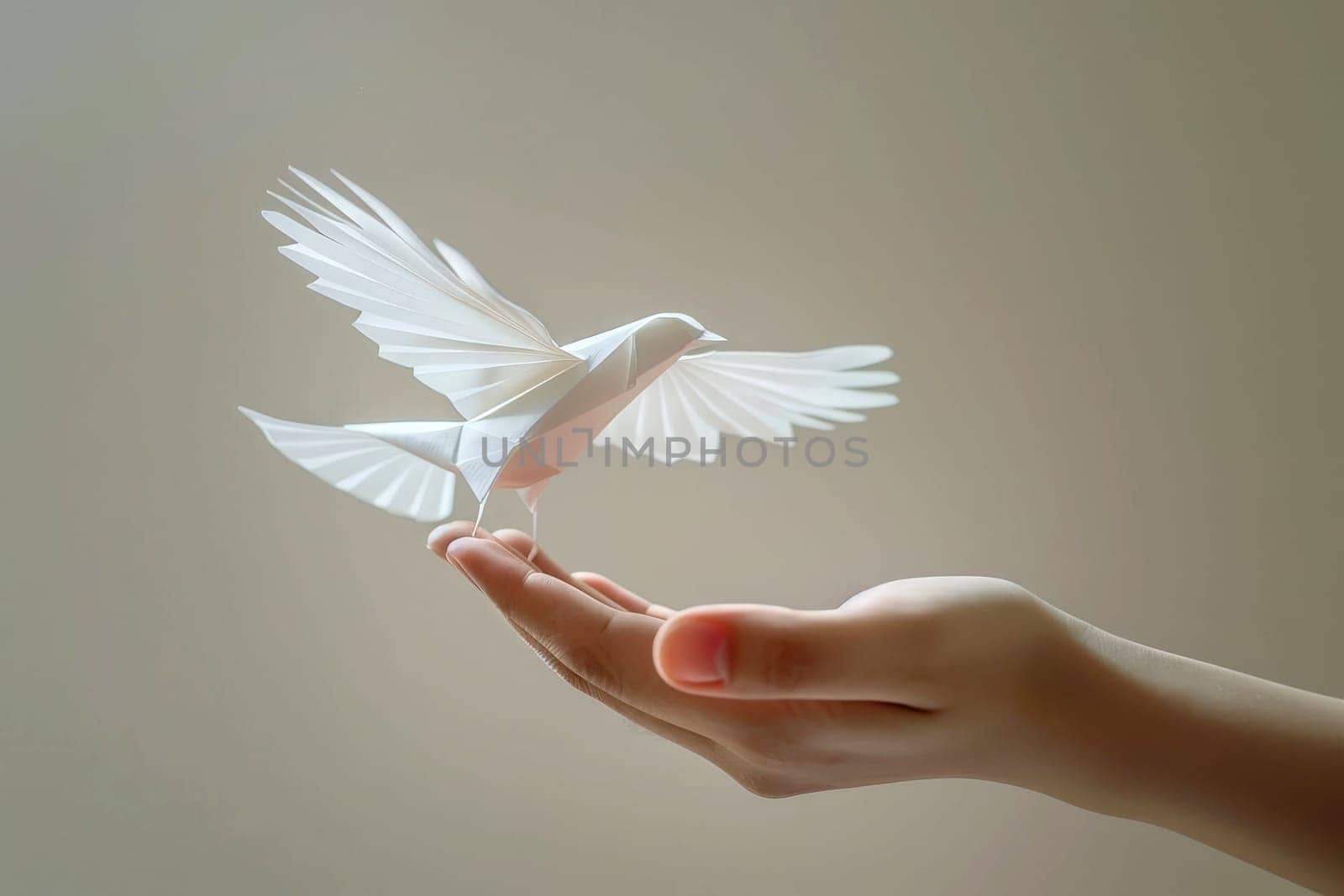 Origami Paper Bird Flight from Open Palm Symbolizing and Freedom to Dream. peach concept.