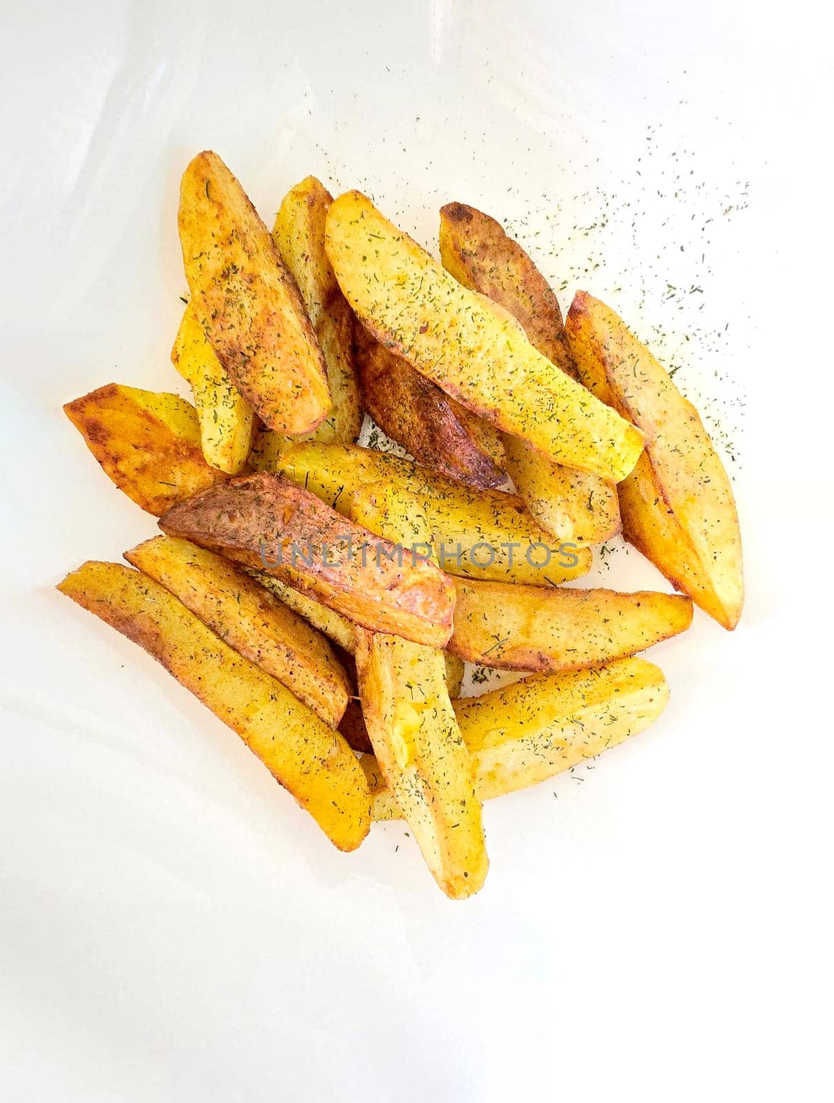 country-style potatoes on a white background, fast food