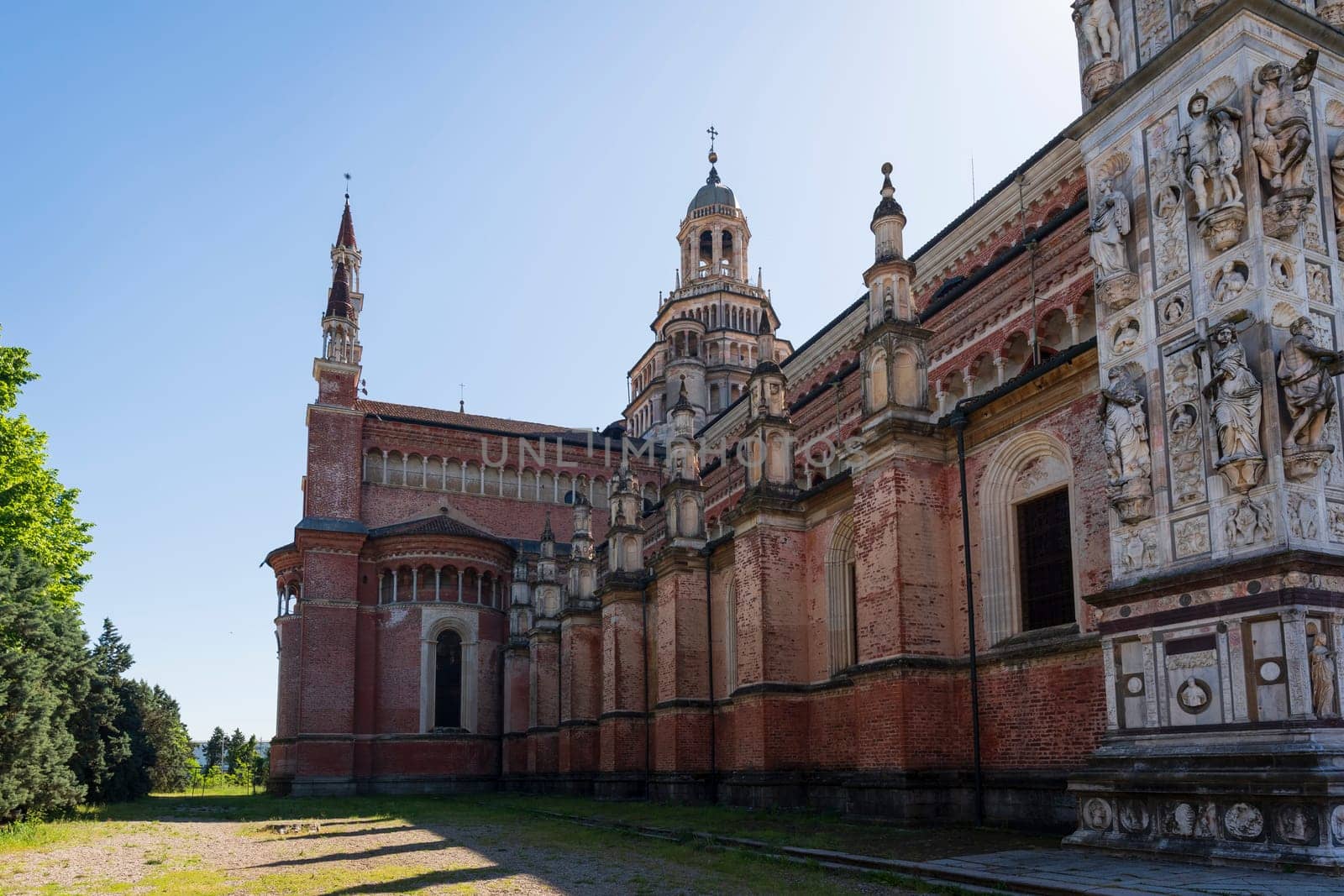 Certosa di Pavia monastery, historical monumental complex that includes a monastery and a sanctuary. .Close up of the church on the left face,Pavia,Italy.