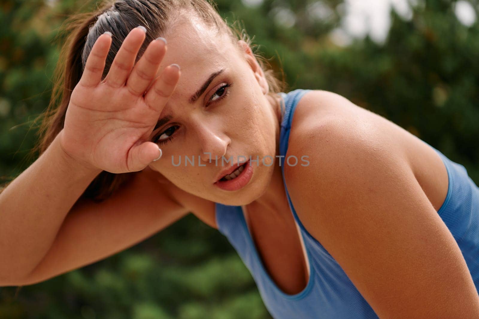 Woman Resting After Intense Run by dotshock