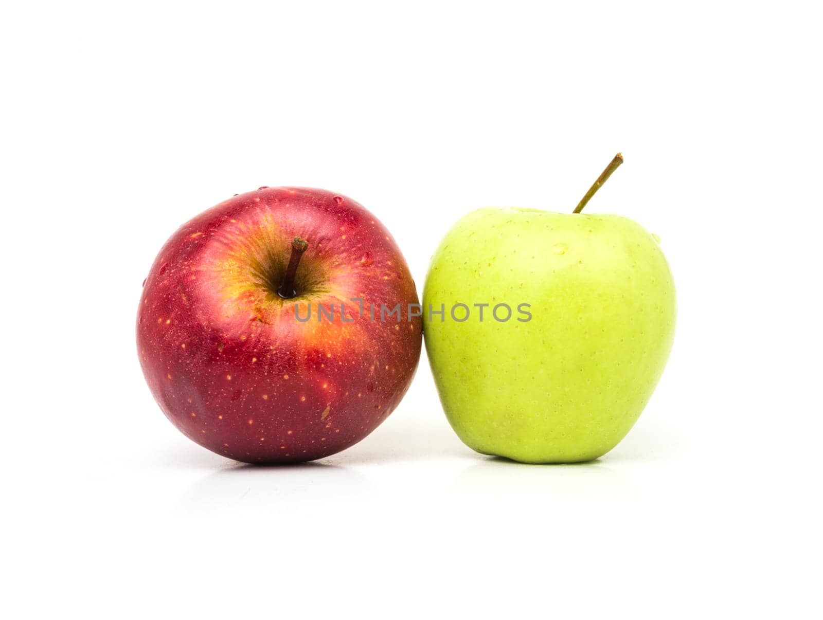 wet red and green apples isolated. High quality photo