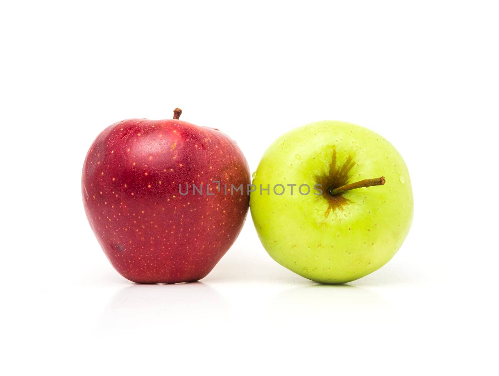 wet red and green apples isolated. High quality photo