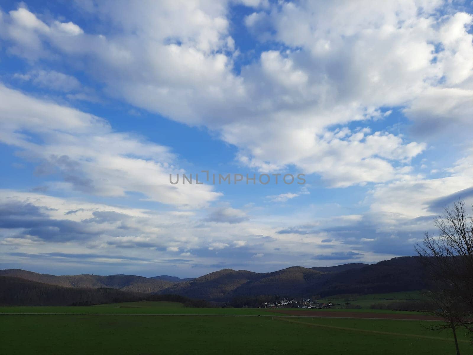 Beauty cloud against a blue sky background. Sky slouds. Blue sky with cloudy weather, nature cloud. White clouds, blue sky and sun. by Costin