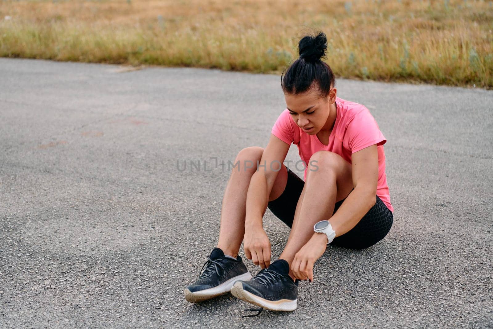 Athletic Woman Preparing for Morning Run by dotshock