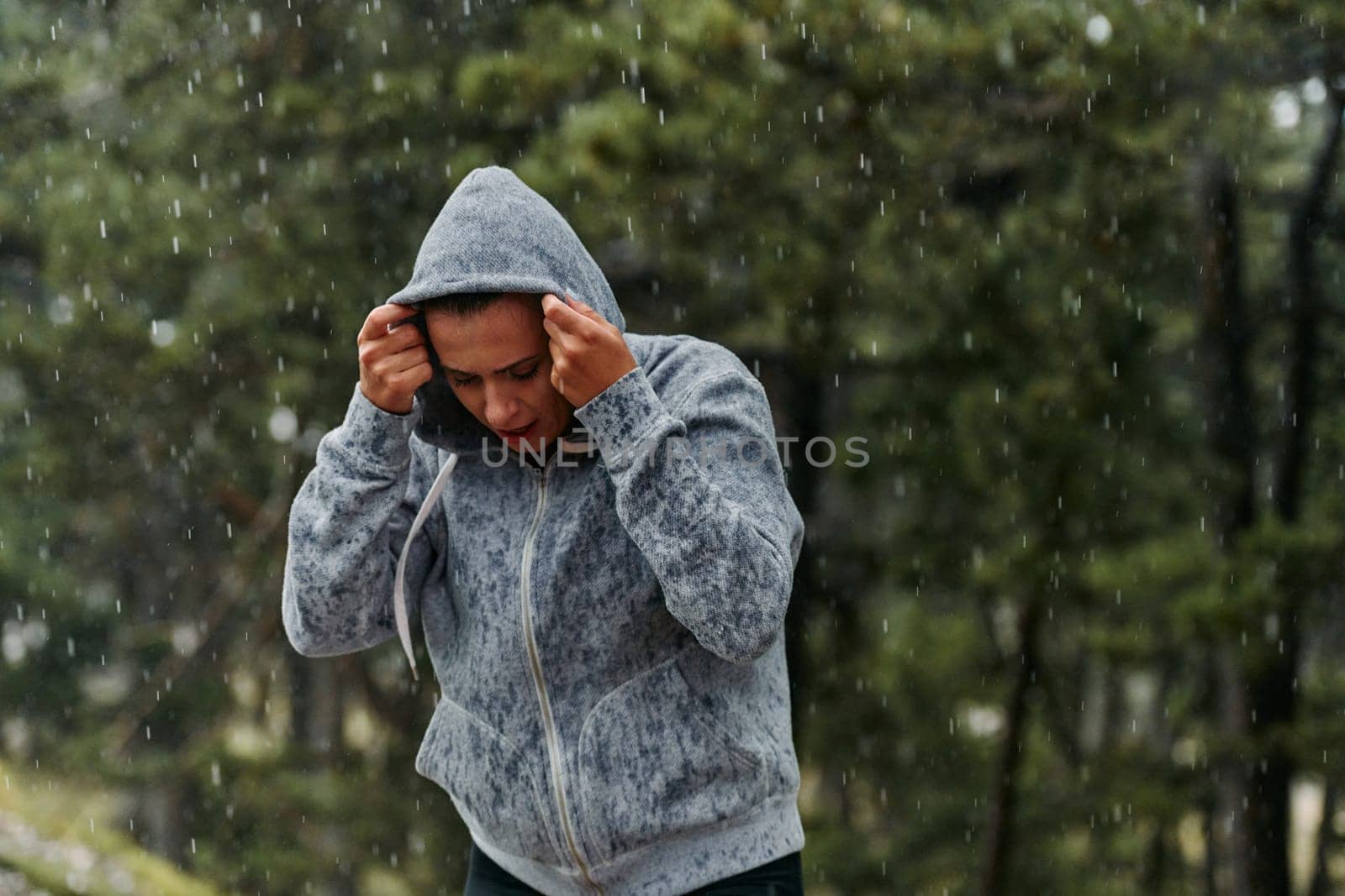 Beautiful Woman Enjoying Rainy Day After Intense Run by dotshock