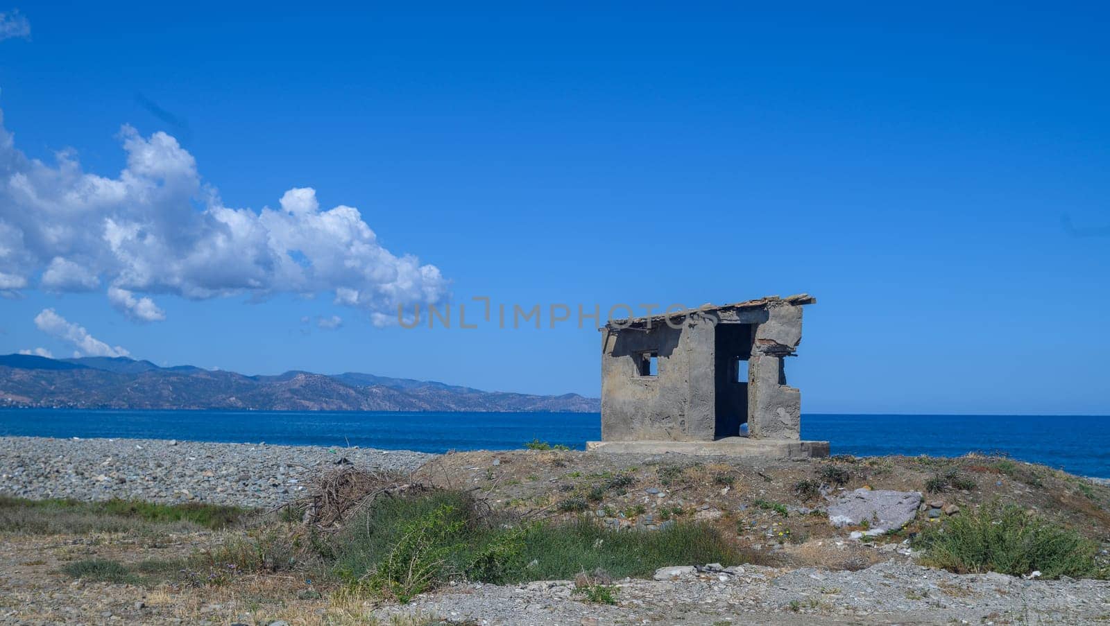 lonely building on the shores of the Mediterranean Sea by Mixa74