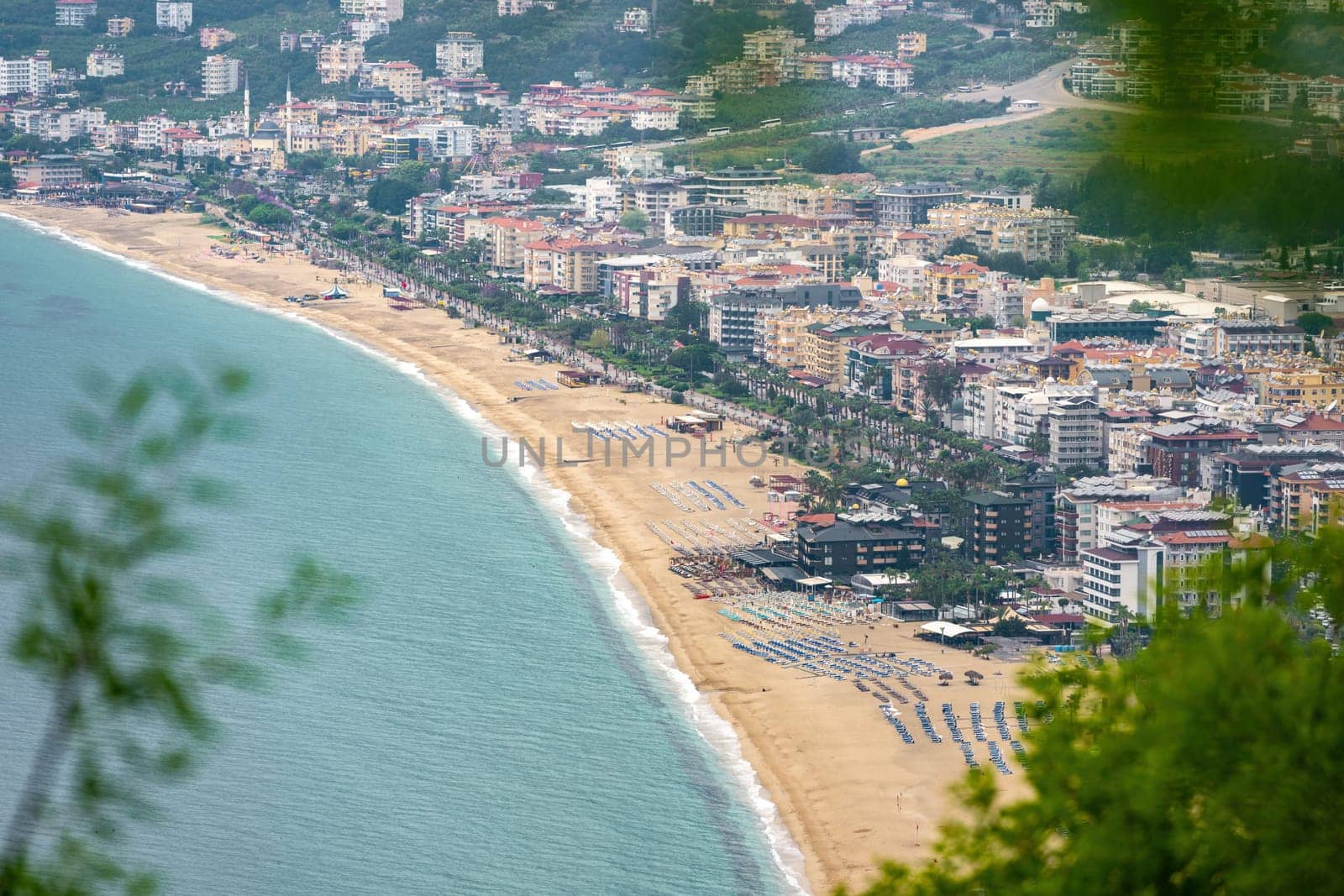 View of Cleopatra beach in Alanya, one of the touristic districts of Antalya, from Alanya Castle by Sonat