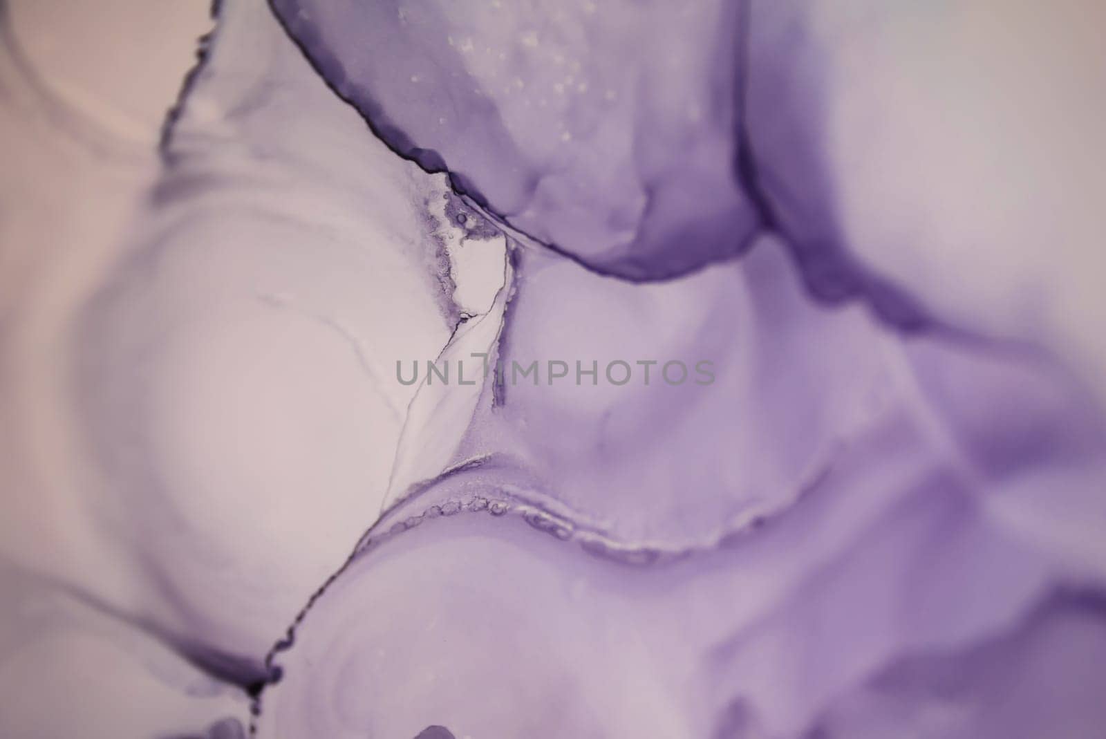 The picture is painted in alcohol ink. Abstraction will perfectly fit into a modern interior. Closeup of the painting. Colorful abstract painting background. Highly-textured paint.