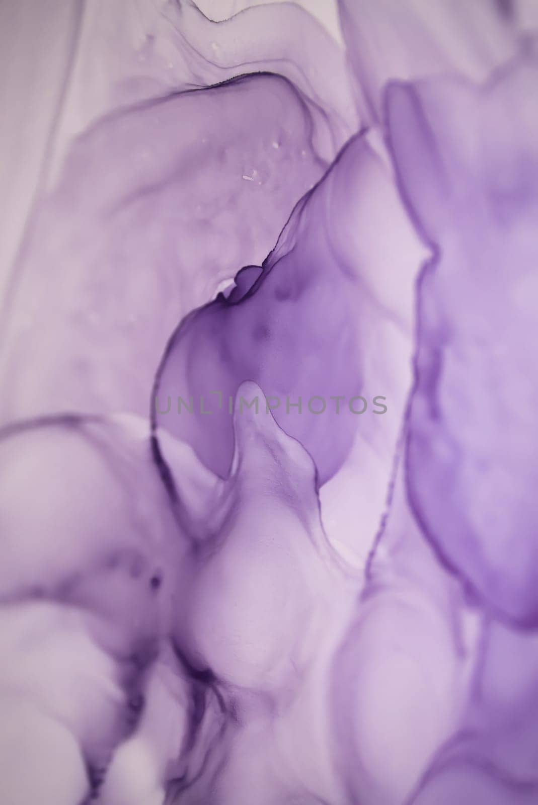 The picture is painted in alcohol ink. Abstraction will perfectly fit into a modern interior. Closeup of the painting. Colorful abstract painting background. Highly-textured paint.