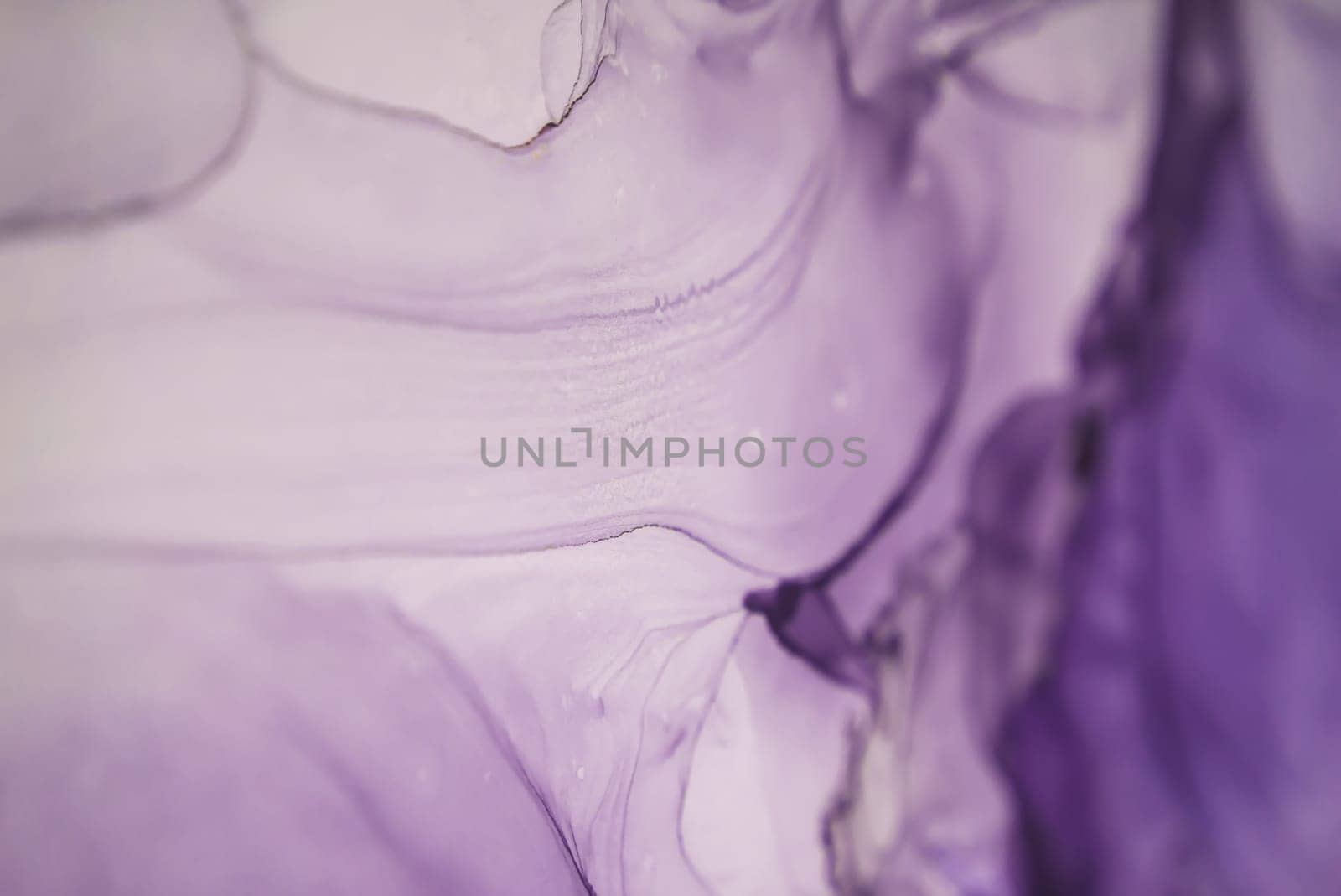 The picture is painted in alcohol ink. Abstraction will perfectly fit into a modern interior. Closeup of the painting. Colorful abstract painting background. Highly-textured paint.