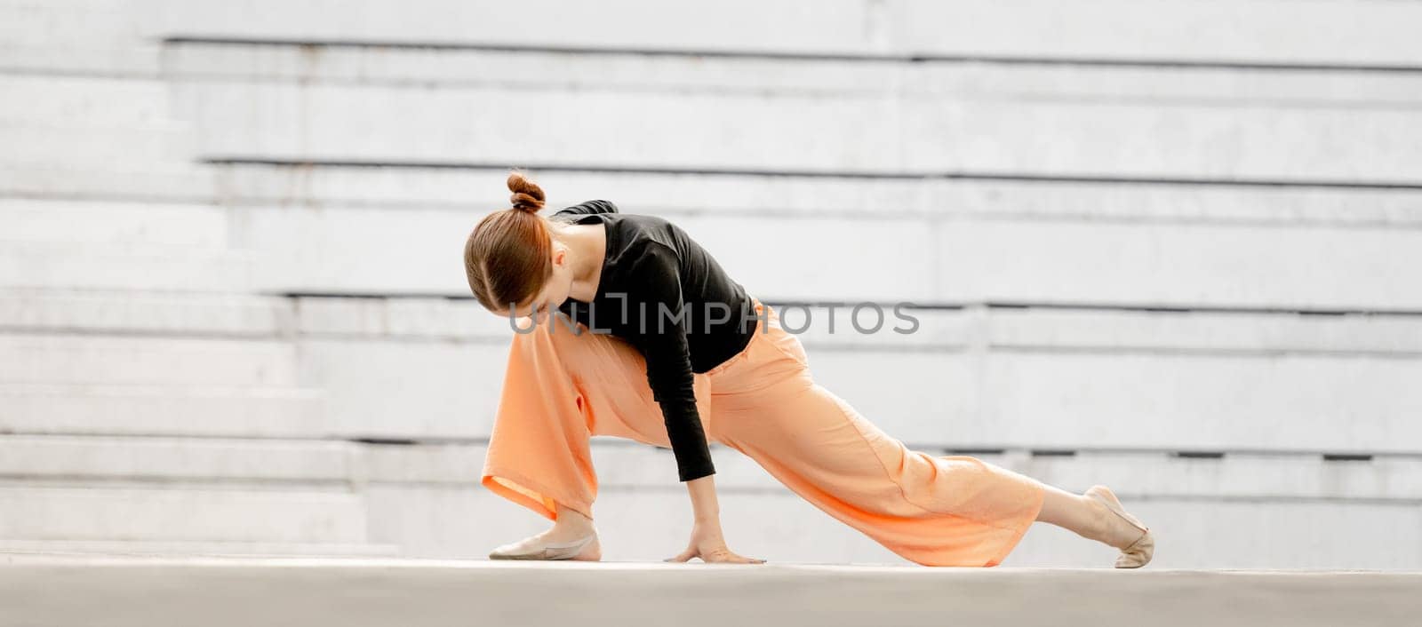 Teenage Girl Performs Contemporary Dance On Stage