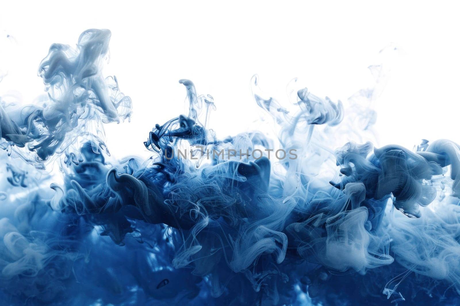 Blue ink swirling in water on white background with copy space for your text by Vichizh