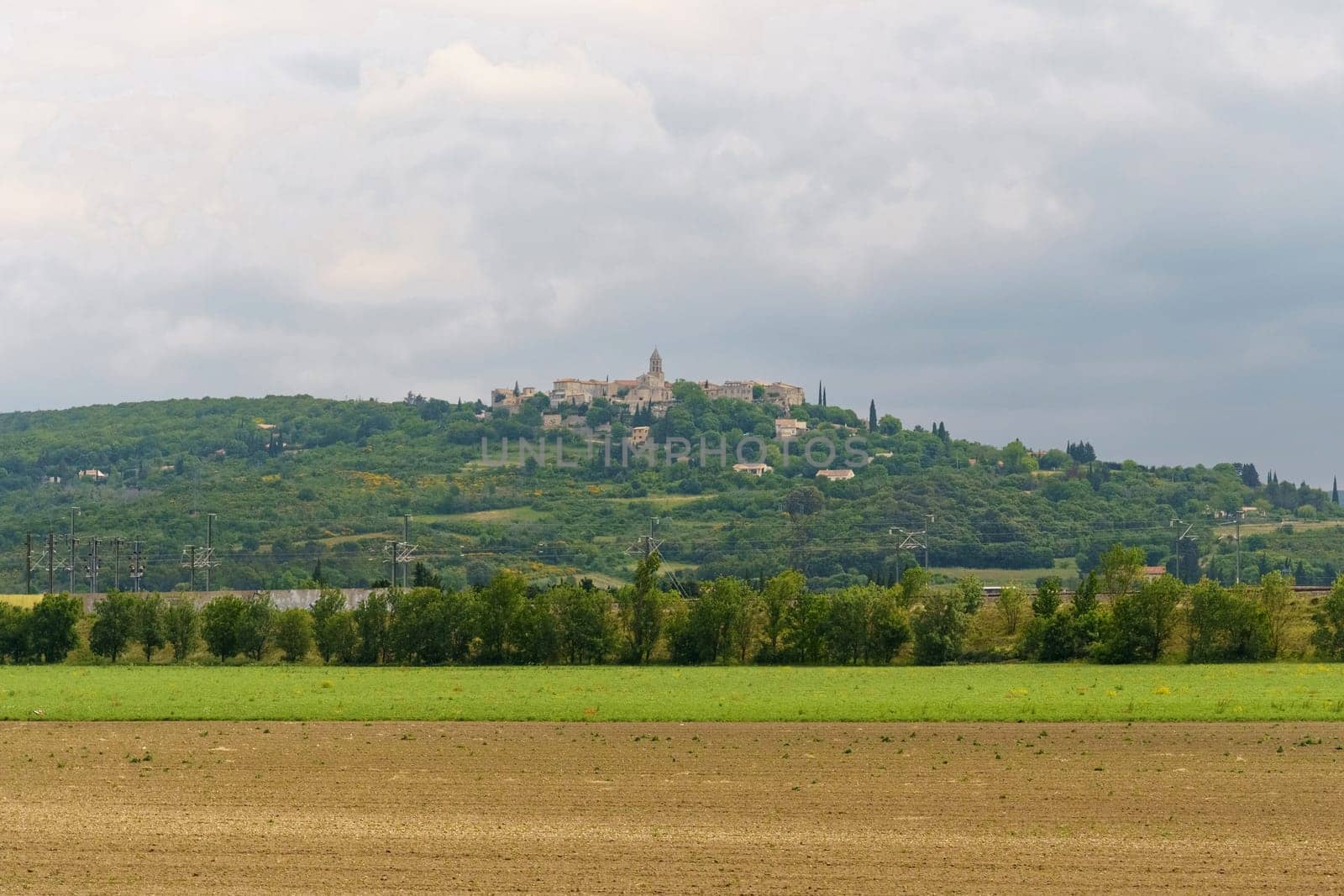 Hilltop Village Landscape in Croatia With Green Fields and Cloudy Sky by Sd28DimoN_1976