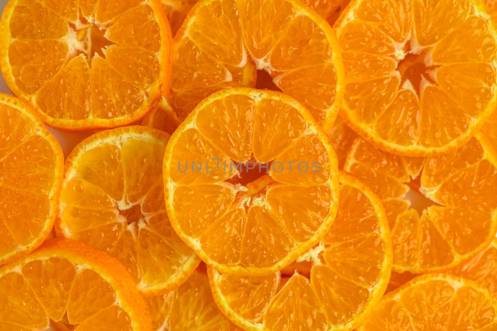 Texture of sweet peeled mandarins as background