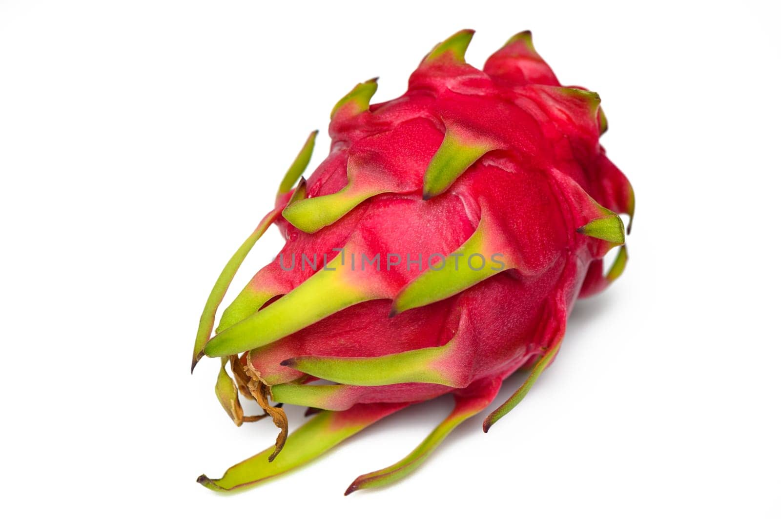 One whole dragon fruit isolated on white background, full depth of field by Mixa74