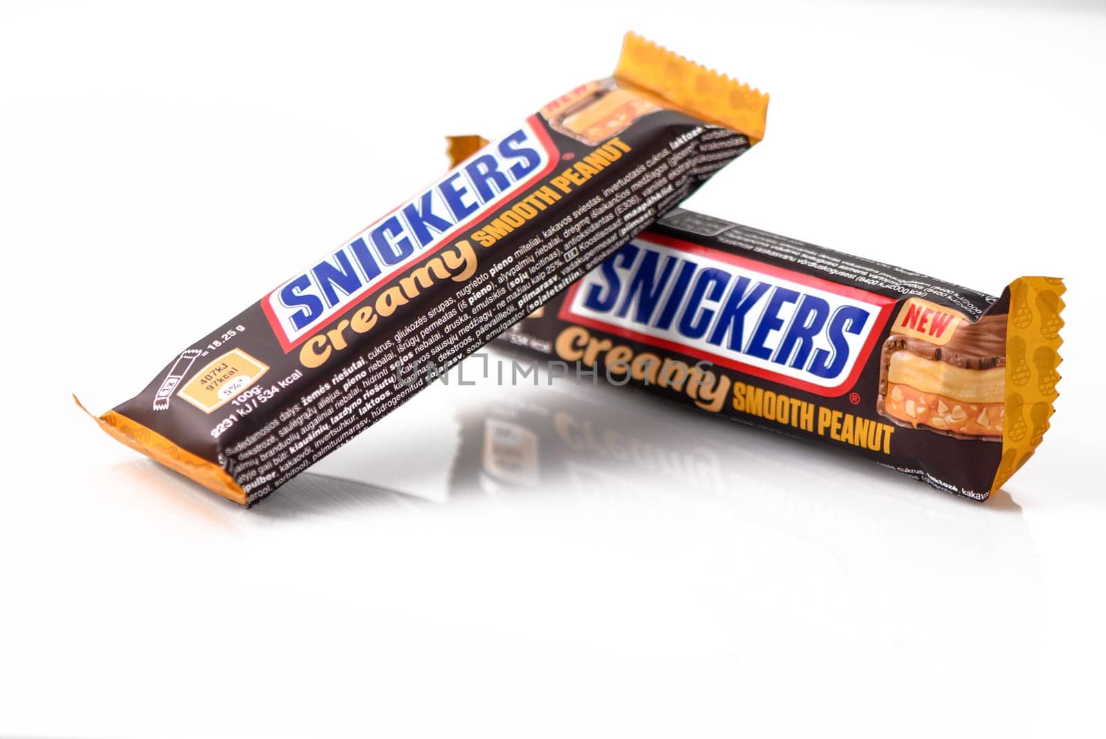 RigaLatvia -08.21.2023 Snickers chocolate bars on white background 12