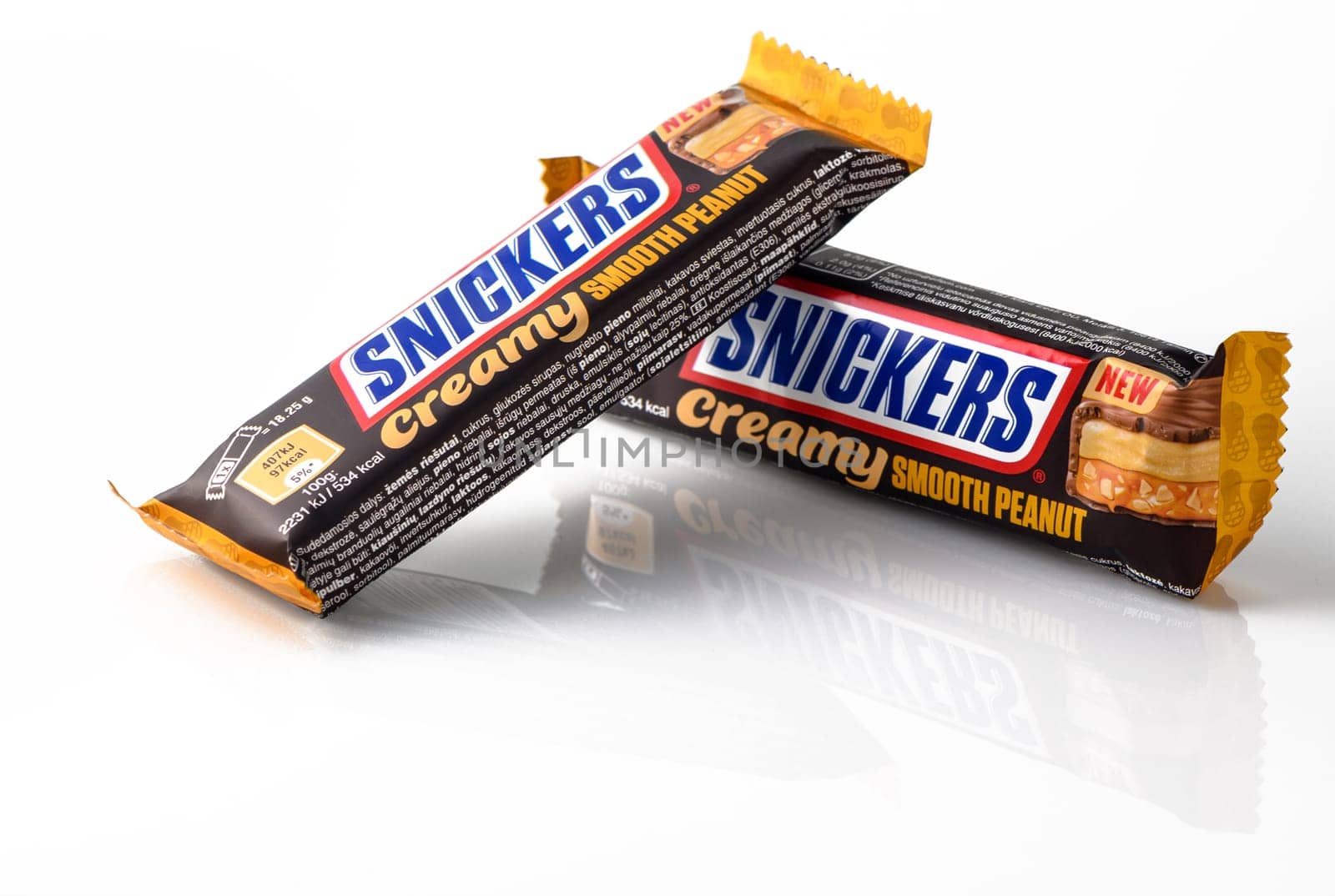 RigaLatvia -08.21.2023 Snickers chocolate bars on white background 3 by Mixa74