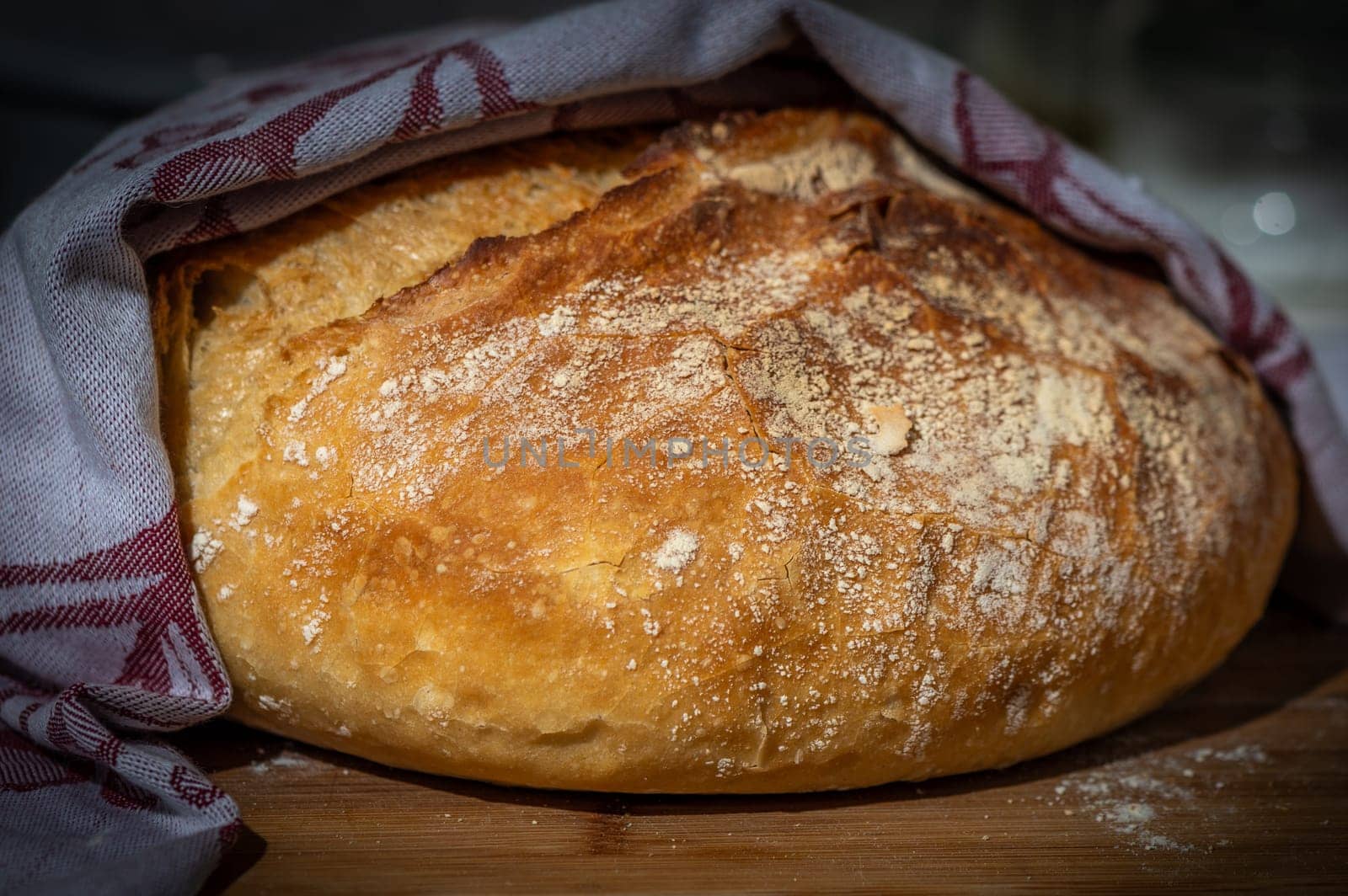 freshly baked loaf of bread from the oven, home recipe for tasty bread by Mixa74