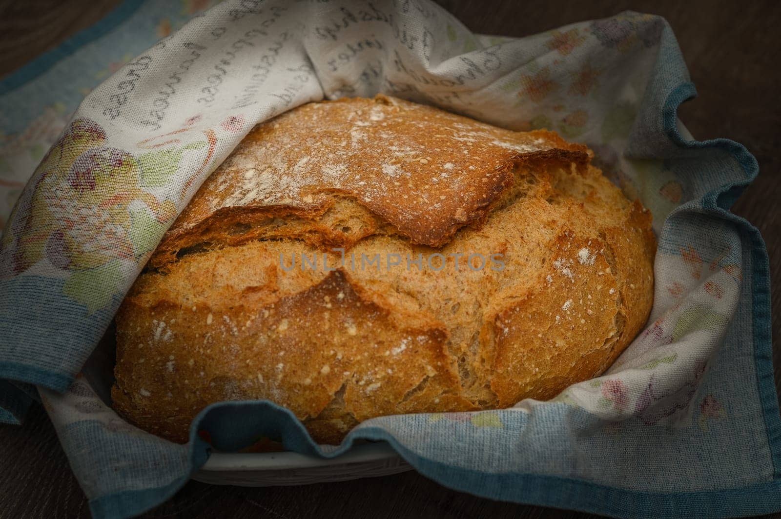 Traditional festive round loaf of bread for wedding on towel. Concept of food, health, traditions, bakery and ad