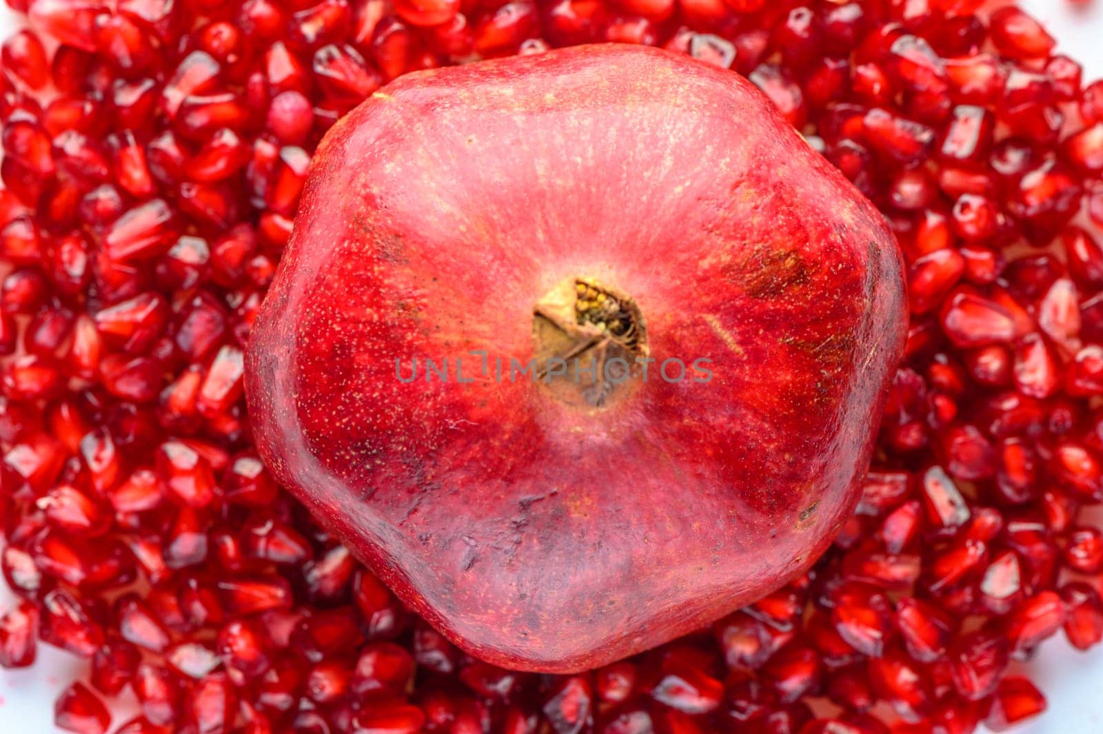 Delicious red ripe juicy pomegranate seed background texture by Mixa74