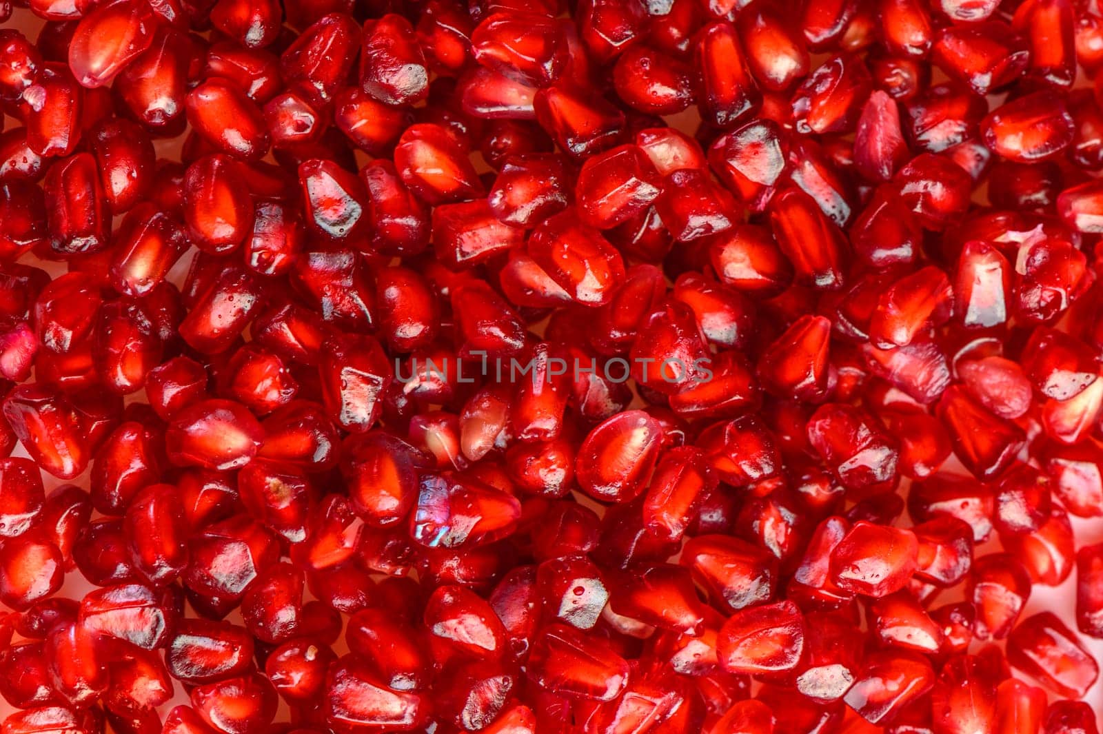 Delicious red ripe juicy pomegranate seed background texture 2 by Mixa74
