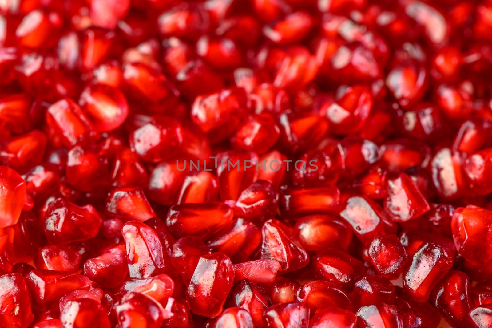 A beautiful red pomegranate seeds background 1 by Mixa74